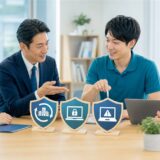保険代理店とIT相談担当者が中小企業の課題と役割分担を整理している様子